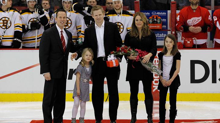 Feb 13, 2011; Detroit, MI, USA; Detroit Red Wings owner Christopher Ilitch (left) poses with goalie Chris Osgood (30) and Osgood's family to recognize him as the 10th goalie in NHL history to win 400 games before the game against the Boston Bruins at Joe Louis Arena. Mandatory Credit: Leon Halip-USA TODAY Sports Feb 13, 2011; Detroit, MI, USA; Detroit Red Wings owner Christopher Ilitch (left) poses with goalie Chris Osgood (30) and Osgood's family to recognize him as the 10th goalie in NHL history to win 400 games before the game against the Boston Bruins at Joe Louis Arena. Mandatory Credit: Leon Halip-USA TODAY Sports