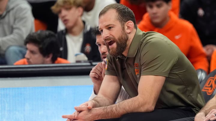 Oklahoma State head wrestling coach David Taylor coaches during the college wrestling dual between Oklahoma State and Air Force at Gallagher-Iba Arena in Stillwater, Okla., Friday, Jan., 3, 2025. Oklahoma State head wrestling coach David Taylor coaches during the college wrestling dual between Oklahoma State and Air Force at Gallagher-Iba Arena in Stillwater, Okla., Friday, Jan., 3, 2025.