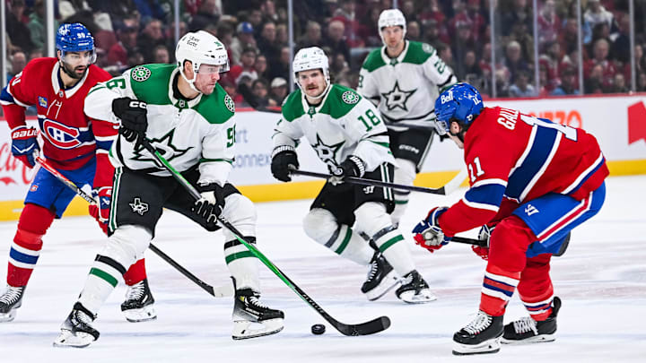 Nov 13, 2025; Montreal, Quebec, CAN; Dallas Stars right wing Mikko Rantanen (96) plays the puck against Montreal Canadiens right wing Brendan Gallagher (11) during the first period at Bell Centre. Mandatory Credit: David Kirouac-Imagn Images Nov 13, 2025; Montreal, Quebec, CAN; Dallas Stars right wing Mikko Rantanen (96) plays the puck against Montreal Canadiens right wing Brendan Gallagher (11) during the first period at Bell Centre. Mandatory Credit: David Kirouac-Imagn Images