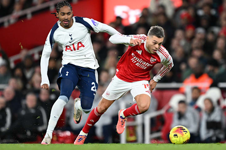 Djed Spence (left) competing with Leandro Trossard.