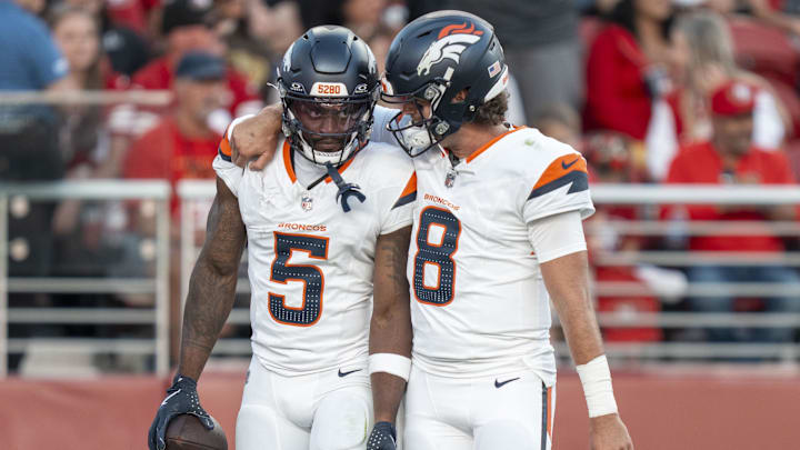 August 9, 2025; Santa Clara, California, USA; Denver Broncos wide receiver Trent Sherfield Sr. (5) is congratulated by quarterback Jarrett Stidham (8) for scoring a touchdown against the San Francisco 49ers during the second quarter at Levi's Stadium. August 9, 2025; Santa Clara, California, USA; Denver Broncos wide receiver Trent Sherfield Sr. (5) is congratulated by quarterback Jarrett Stidham (8) for scoring a touchdown against the San Francisco 49ers during the second quarter at Levi's Stadium.