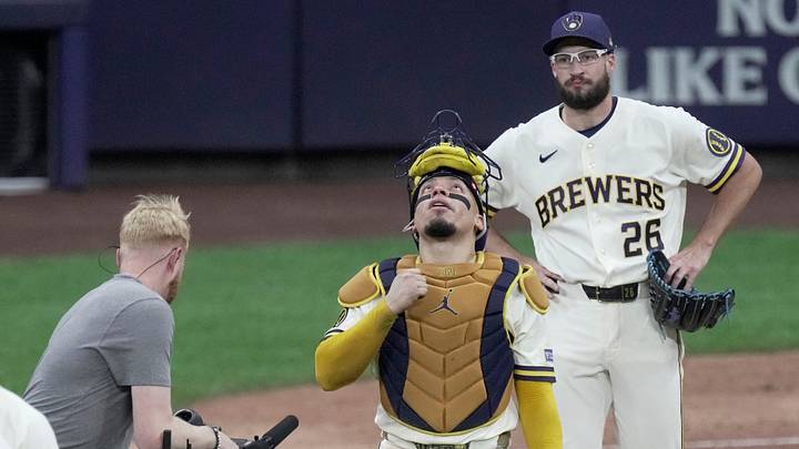 Milwaukee Brewers catcher William Contreras (24) reacts after their NLCS game as pitcher Aaron Ashby (26) looks on Monday, Oct. 12, 2026 at American Family Field in Milwaukee, Wisconsin. The Milwaukee Brewers beat the Los Angeles Dodgers 7-4 to lead the series 2-0. Milwaukee Brewers catcher William Contreras (24) reacts after their NLCS game as pitcher Aaron Ashby (26) looks on Monday, Oct. 12, 2026 at American Family Field in Milwaukee, Wisconsin. The Milwaukee Brewers beat the Los Angeles Dodgers 7-4 to lead the series 2-0.