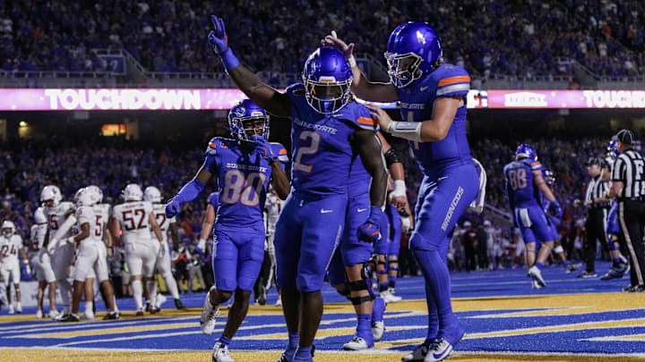 Boise State Broncos running back Ashton Jeanty (2) and quarterback Maddux Madsen celebrate.
