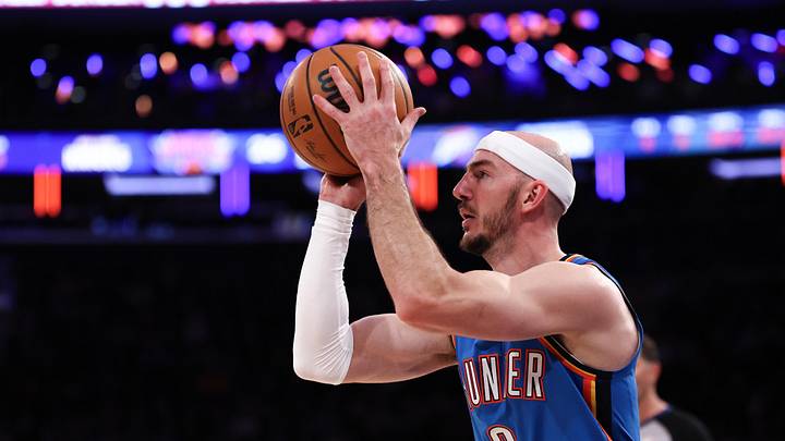 Mar 4, 2026; New York, New York, USA; Oklahoma City Thunder guard Alex Caruso (9) shoots the ball against the New York Knicks during the first half at Madison Square Garden. Mandatory Credit: Vincent Carchietta-Imagn Images