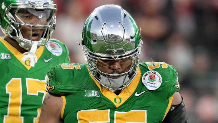 Jan 1, 2025; Pasadena, CA, USA; Oregon Ducks defensive lineman Derrick Harmon (55) reacts in the second half against the Ohio State Buckeyes in the 2025 Rose Bowl college football quarterfinal game at Rose Bowl Stadium. Mandatory Credit: Kirby Lee-Imagn Images Jan 1, 2025; Pasadena, CA, USA; Oregon Ducks defensive lineman Derrick Harmon (55) reacts in the second half against the Ohio State Buckeyes in the 2025 Rose Bowl college football quarterfinal game at Rose Bowl Stadium. Mandatory Credit: Kirby Lee-Imagn Images