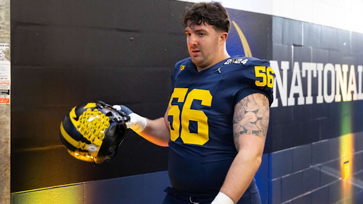 Jan 8, 2024; Houston, TX, USA; Michigan Wolverines offensive lineman Dominick Giudice (56) against the Washington Huskies during the 2024 College Football Playoff national championship game at NRG Stadium. Mandatory Credit: Mark J. Rebilas-Imagn Images