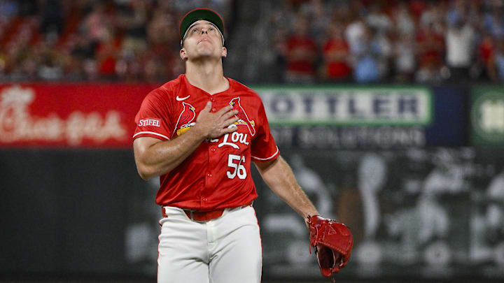 Jul 25, 2025; St. Louis, Missouri, USA;  St. Louis Cardinals relief pitcher Ryan Helsley (56) reacts after the Cardinals defeated the San Diego Padres at Busch Stadium. 