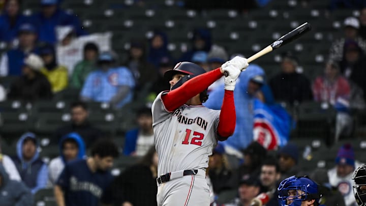 Mar 26, 2026; Chicago, Illinois, USA; Washington Nationals third baseman Brady House (12) hits a two-run home run against the Chicago Cubs during the ninth inning at Wrigley Field. Mandatory Credit: Matt Marton-Imagn Images Mar 26, 2026; Chicago, Illinois, USA; Washington Nationals third baseman Brady House (12) hits a two-run home run against the Chicago Cubs during the ninth inning at Wrigley Field. Mandatory Credit: Matt Marton-Imagn Images
