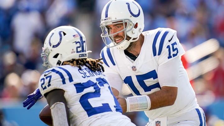 Indianapolis Colts quarterback Joe Flacco (15) hands off to running back Trey Sermon (27) during the fourth quarter against the Tennessee Titans at Nissan Stadium in Nashville, Tenn., Sunday, Oct. 13, 2024. Indianapolis Colts quarterback Joe Flacco (15) hands off to running back Trey Sermon (27) during the fourth quarter against the Tennessee Titans at Nissan Stadium in Nashville, Tenn., Sunday, Oct. 13, 2024.