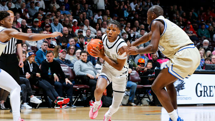 Paul VI's Ben Hammond drives to the basket as the Panthers took on the McEachern Indians during the