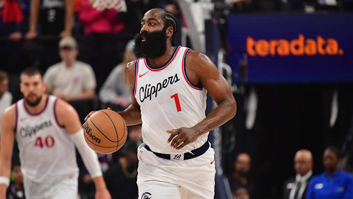 Dec 1, 2024; Inglewood, California, USA; Los Angeles Clippers guard James Harden (1) moves the ball down court against the Denver Nuggets during the first half at Intuit Dome. Mandatory Credit: Gary A. Vasquez-Imagn Images