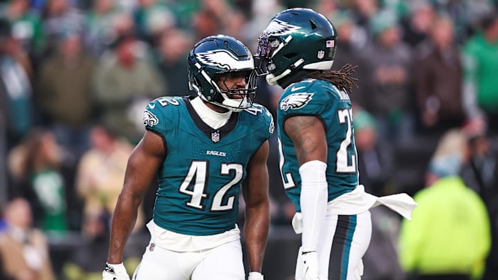 Jan 12, 2025; Philadelphia, Pennsylvania, USA; Philadelphia Eagles linebacker Oren Burks (42) reacts with cornerback Kelee Ringo (22) against the Green Bay Packers in an NFC wild card game at Lincoln Financial Field. Mandatory Credit: Bill Streicher-Imagn Images