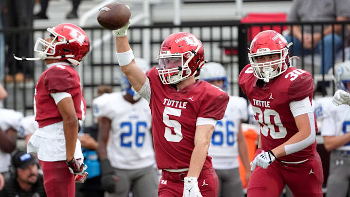 Tuttle's Tyson Kennedy celebrates an interception during the high school football game between Tuttle and Guthrie at Tuttle High School in Tuttle, Okla., Thursday, Aug. 28, 2025.