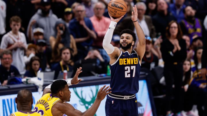 Apr 29, 2024; Denver, Colorado, USA; Denver Nuggets guard Jamal Murray (27) takes a shot against Los