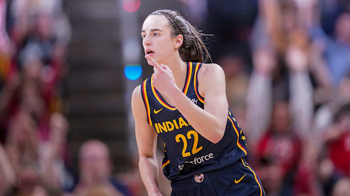 Indiana Fever guard Caitlin Clark (22) reacts to scoring three points Thursday, May 9, 2024, during the preseason game against the Atlanta Dream at Gainbridge Fieldhouse in Indianapolis. The Indiana Fever defeated the Atlanta Dream, 83-80. Indiana Fever guard Caitlin Clark (22) reacts to scoring three points Thursday, May 9, 2024, during the preseason game against the Atlanta Dream at Gainbridge Fieldhouse in Indianapolis. The Indiana Fever defeated the Atlanta Dream, 83-80.