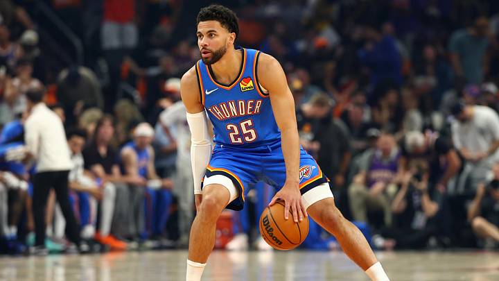 Apr 27, 2026; Phoenix, Arizona, USA; Oklahoma City Thunder guard Ajay Mitchell (25) against the Phoenix Suns during game four of the first round of the 2026 NBA Playoffs at Mortgage Matchup Center. Mandatory Credit: Mark J. Rebilas-Imagn Images Apr 27, 2026; Phoenix, Arizona, USA; Oklahoma City Thunder guard Ajay Mitchell (25) against the Phoenix Suns during game four of the first round of the 2026 NBA Playoffs at Mortgage Matchup Center. Mandatory Credit: Mark J. Rebilas-Imagn Images