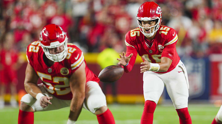 Sep 5, 2024; Kansas City, Missouri, USA; Kansas City Chiefs starting quarterback Patrick Mahomes (15) takes the snap from center Creed Humphrey (52) during the second half against the Baltimore Ravens at GEHA Field at Arrowhead Stadium. Mandatory Credit: Jay Biggerstaff-Imagn Images Sep 5, 2024; Kansas City, Missouri, USA; Kansas City Chiefs starting quarterback Patrick Mahomes (15) takes the snap from center Creed Humphrey (52) during the second half against the Baltimore Ravens at GEHA Field at Arrowhead Stadium. Mandatory Credit: Jay Biggerstaff-Imagn Images
