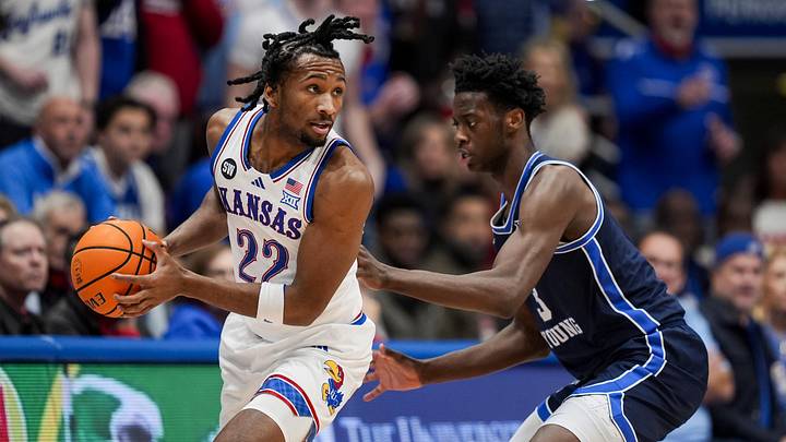 Jan 24, 2026; Columbia, Missouri, USA; Kansas Jayhawks guard Darryn Peterson (22) looks to pass against BYU Cougars forward AJ Dybantsa (3) during the first half at Mizzou Arena. Mandatory Credit: Jay Biggerstaff-Imagn Images Jan 24, 2026; Columbia, Missouri, USA; Kansas Jayhawks guard Darryn Peterson (22) looks to pass against BYU Cougars forward AJ Dybantsa (3) during the first half at Mizzou Arena. Mandatory Credit: Jay Biggerstaff-Imagn Images