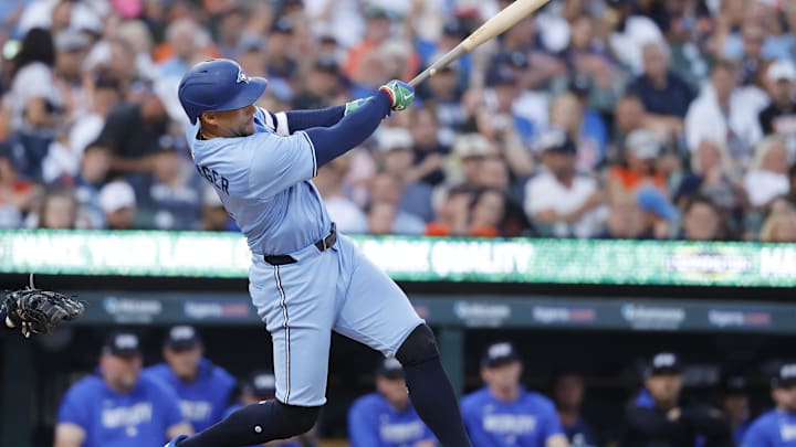 Jul 25, 2025; Detroit, Michigan, USA; Toronto Blue Jays outfielder George Springer (4) hits a single in the fifth inning against the Detroit Tigers at Comerica Park. Jul 25, 2025; Detroit, Michigan, USA; Toronto Blue Jays outfielder George Springer (4) hits a single in the fifth inning against the Detroit Tigers at Comerica Park.