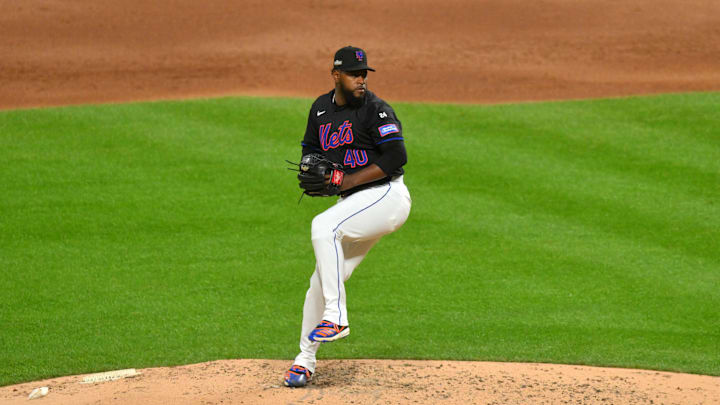 Oct 16, 2024; New York City, New York, USA; rows a pitch against the Los Angeles Dodgers New York Mets pitcher Luis Severino (40) thin the second inning during game three of the NLCS for the 2024 MLB playoffs at Citi Field. Mandatory Credit: John Jones-Imagn Images