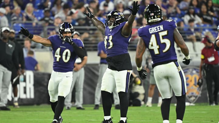 Aug 7, 2025; Baltimore, Maryland, USA; Baltimore Ravens defensive tackle Aeneas Peebles (93) celebrates after batting down a pass at the line of scrimmage against the Indianapolis Colts during the third quarter at M&T Bank Stadium. Mandatory Credit: Rafael Suanes-Imagn Images