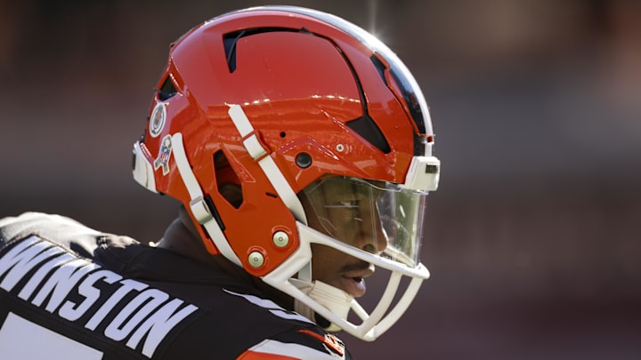Nov 3, 2024; Cleveland, Ohio, USA; Cleveland Browns quarterback Jameis Winston (5) pumps up his teammates during warm ups before the game against the Los Angeles Chargers at Huntington Bank Field. 
