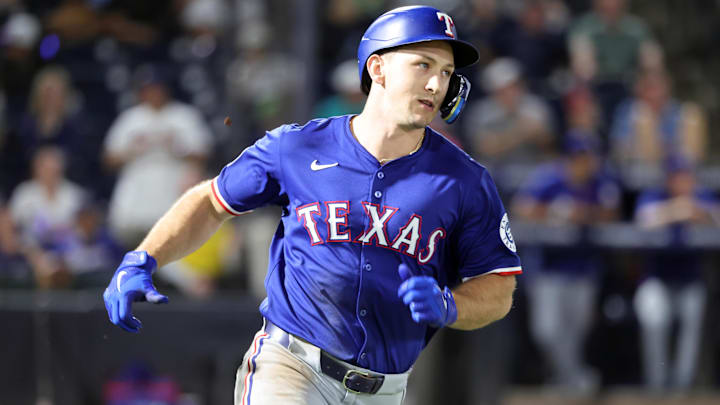 Jun 4, 2025; St. Petersburg, Florida, USA; Texas Rangers outfielder Wyatt Langford (36) singles