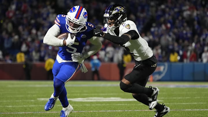 Sep 7, 2025; Orchard Park, New York, USA; Buffalo Bills wide receiver Joshua Palmer (5) runs the ball against Baltimore Ravens cornerback Nate Wiggins (2) during the fourth quarter at Highmark Stadium. Sep 7, 2025; Orchard Park, New York, USA; Buffalo Bills wide receiver Joshua Palmer (5) runs the ball against Baltimore Ravens cornerback Nate Wiggins (2) during the fourth quarter at Highmark Stadium.