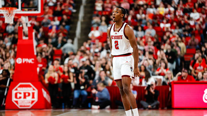 Feb 1, 2025; Raleigh, North Carolina, USA; North Carolina State Wolfpack guard Paul McNeil (2) reacts to his point ball during the first half of the game against the Clemson Tigers at Lenovo Center. Feb 1, 2025; Raleigh, North Carolina, USA; North Carolina State Wolfpack guard Paul McNeil (2) reacts to his point ball during the first half of the game against the Clemson Tigers at Lenovo Center.