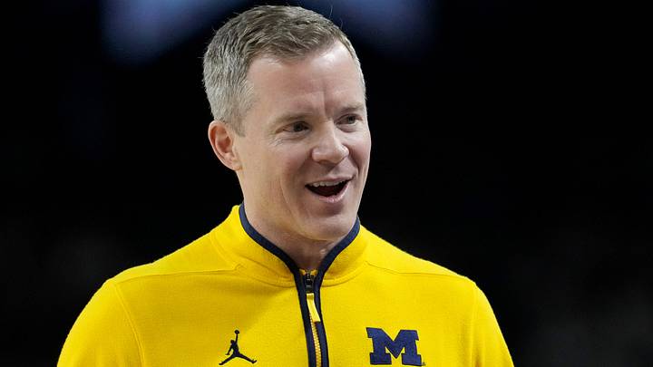 Michigan Wolverines head coach Dusty May talks with his team Monday, April 6, 2026, during the NCAA men's basketball tournament national championship game against the UConn Huskies at Lucas Oil Stadium in Indianapolis. Michigan Wolverines head coach Dusty May talks with his team Monday, April 6, 2026, during the NCAA men's basketball tournament national championship game against the UConn Huskies at Lucas Oil Stadium in Indianapolis.