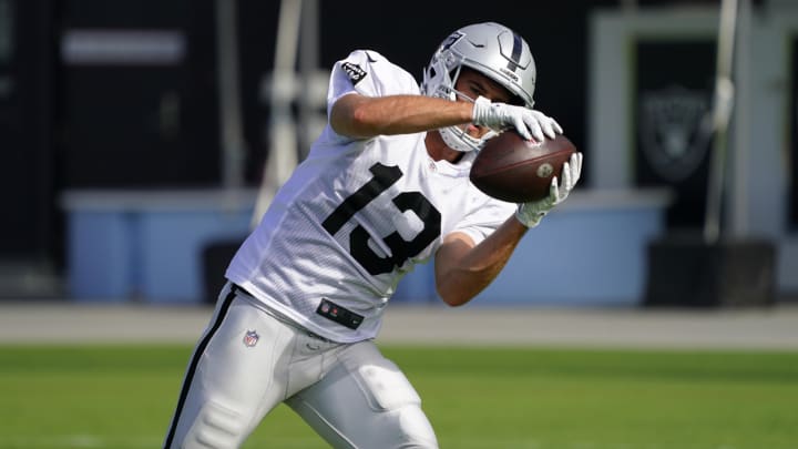 Jul 27, 2022; Las Vegas, Nevada, US; Las Vegas Raiders wide receiver Hunter Renfrow (13) catches the ball during training camp at Intermountain Healthcare Performance Center. Jul 27, 2022; Las Vegas, Nevada, US; Las Vegas Raiders wide receiver Hunter Renfrow (13) catches the ball during training camp at Intermountain Healthcare Performance Center.