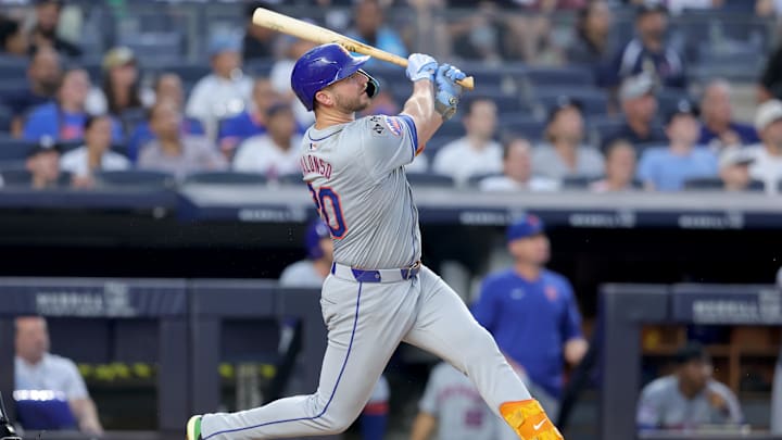 Jul 24, 2024; Bronx, New York, USA; New York Mets first baseman Pete Alonso (20) follows through on a two run home run against the New York Yankees during the fourth inning at Yankee Stadium. Mandatory Credit: Brad Penner-Imagn Images