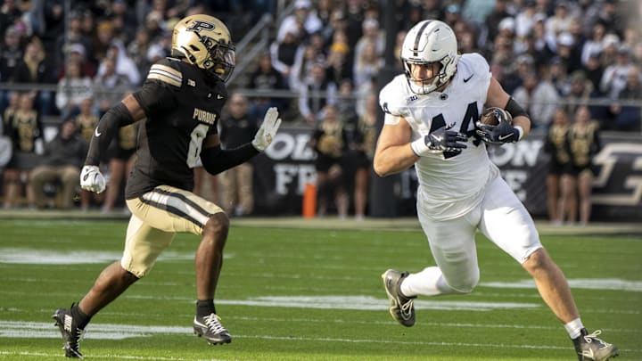 Penn State Nittany Lions tight end Tyler Warren is defended by Purdue Boilermakers defensive back Smiley Bradford during the first quarter at Ross-Ade Stadium. Penn State Nittany Lions tight end Tyler Warren is defended by Purdue Boilermakers defensive back Smiley Bradford during the first quarter at Ross-Ade Stadium.