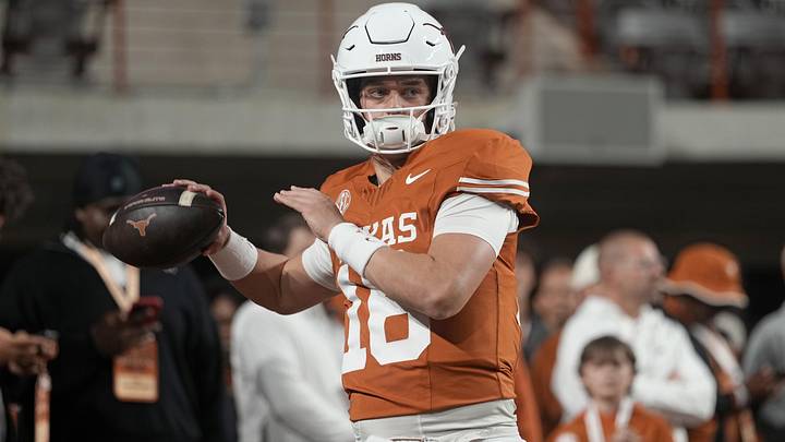 Nov 28, 2025; Austin, Texas, USA; Texas Longhorns quarterback Arch Manning warms up before a game against the Texas A&M Aggies at Darrell K Royal-Texas Memorial Stadium. Nov 28, 2025; Austin, Texas, USA; Texas Longhorns quarterback Arch Manning warms up before a game against the Texas A&M Aggies at Darrell K Royal-Texas Memorial Stadium.