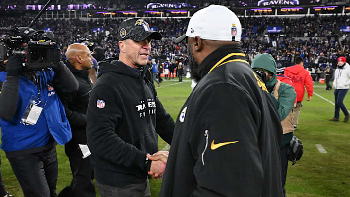 Baltimore Ravens head coach John Harbaugh shakes hands with Pittsburgh Steelers head coach Mike Tomlin after a game. Baltimore Ravens head coach John Harbaugh shakes hands with Pittsburgh Steelers head coach Mike Tomlin after a game.