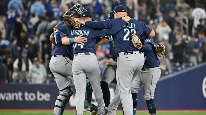 Seattle Mariners players celebrate a win against the Toronto Blue Jays on April 20 at Rogers Centre.