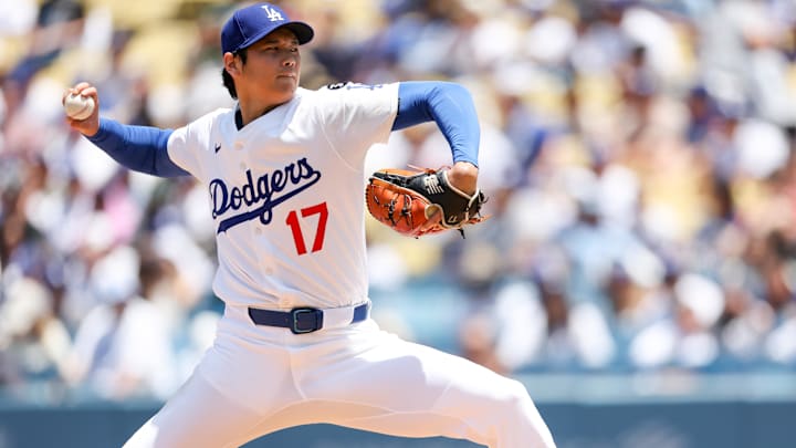 Jun 22, 2025; Los Angeles, California, USA; Los Angeles Dodgers two‑way player Shohei Ohtani (17) pitches the ball during the second inning against Washington Nationals at Dodger Stadium. Mandatory Credit: Kiyoshi Mio-Imagn Images