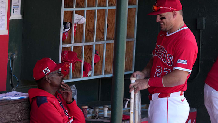 March 9, 2025; Tempe, Arizona, USA; Los Angeles Angels manager Ron Washington (37) and outfielder Mike Trout (27) get ready for a game against the Cincinnati Reds at Tempe Diablo Stadium. Mandatory Credit: Rick Scuteri-Imagn Images