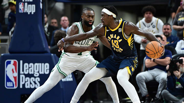 Oct 30, 2024; Indianapolis, Indiana, USA; Indiana Pacers forward Pascal Siakam (43) pushes toward the basket against Boston Celtics guard Jaylen Brown (7) during overtime at Gainbridge Fieldhouse. Mandatory Credit: Marc Lebryk-Imagn Images