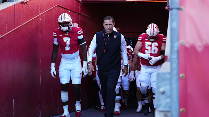 Oct 11, 2025; Madison, Wisconsin, USA; Wisconsin Badgers head coach Luke Fickell leads his team out of the tunnel at Camp Randall Stadium. Mandatory Credit: Ross Harried-Imagn Images