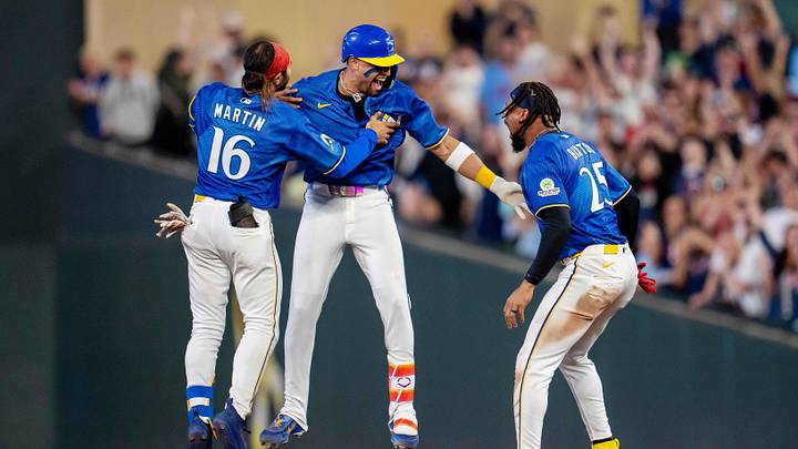 Jun 26, 2026; Minneapolis, Minnesota, USA; Minnesota Twins first baseman Royce Lewis (23) celebrates with center fielder Austin Martin (16) and center fielder Byron Buxton (25) hitting a game winning single against the Colorado Rockies in the tenth inning at Target Field. Mandatory Credit: Jesse Johnson-Imagn Images