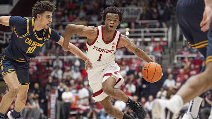 Jan 24, 2026; Stanford, California, USA;  Stanford Cardinal guard Ebuka Okorie (1) drives the ball during the first half against California Golden Bears guard Justin Pippen (10) at Maples Pavilion. Mandatory Credit: Stan Szeto-Imagn Images
