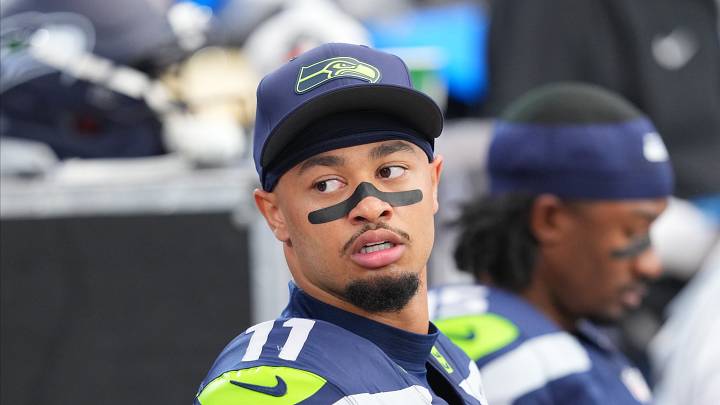 Sep 20, 2026; Glendale, Arizona, USA;  Seattle Seahawks wide receiver Jaxon Smith-Njigba (11) looks on from the sideline during the first half against the Arizona Cardinals at State Farm Stadium.  Mandatory Credit: Joe Camporeale-Imagn Images