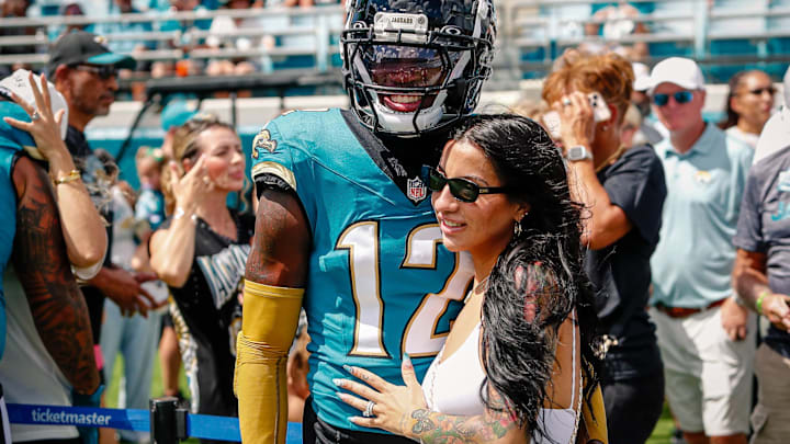Jacksonville Jaguars player Travis Hunter (12) with his wife during pregame against the Houston Texans at EverBank Stadium. Jacksonville Jaguars player Travis Hunter (12) with his wife during pregame against the Houston Texans at EverBank Stadium.
