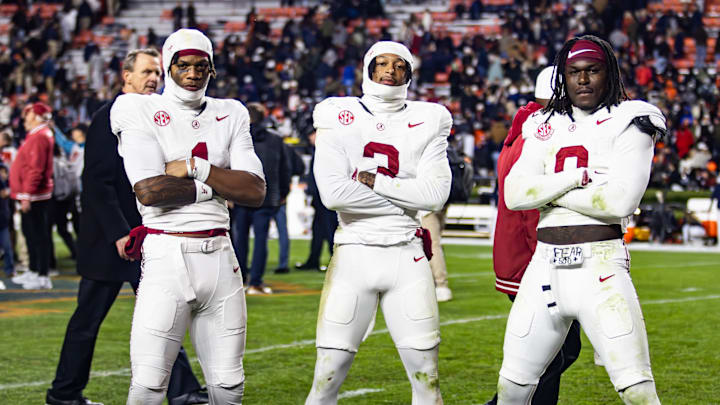 Alabama players Isaiah Horton, Keon Sabb, and Deontae Lawson celebrate the Iron Bowl Win on November 29, 2025.