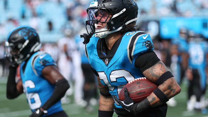 Sep 21, 2025; Charlotte, North Carolina, USA; Carolina Panthers safety Lathan Ransom (22) reacts after making an interception during the second half against the Atlanta Falcons at Bank of America Stadium. 