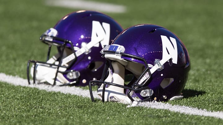 Sep 30, 2017; Madison, WI, USA; Northwestern Wildcats helmets on the field prior to the game against the Wisconsin Badgers at Camp Randall Stadium. Mandatory Credit: Jeff Hanisch-Imagn Images