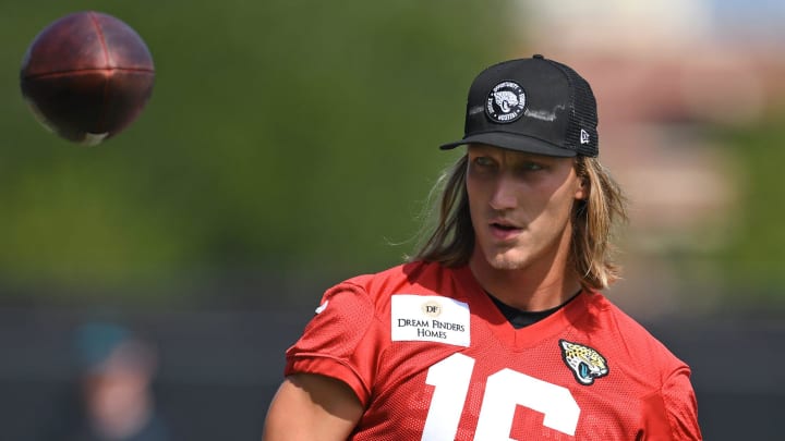 Jacksonville Jaguars quarterback Trevor Lawrence (16) watches the ball after bouncing it off his foot during a break between drills at the organized team activity session Monday, June 3, 2024 at EverBank Stadium's Miller Electric Center in Jacksonville, Fla. Jacksonville Jaguars quarterback Trevor Lawrence (16) watches the ball after bouncing it off his foot during a break between drills at the organized team activity session Monday, June 3, 2024 at EverBank Stadium's Miller Electric Center in Jacksonville, Fla.