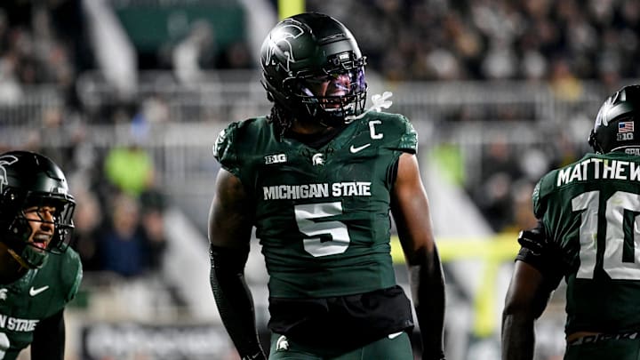 Michigan State's Jordan Hall celebrates after a stop against Michigan during the second quarter on Saturday, Oct. 25, 2025, at Spartan Stadium in East Lansing.