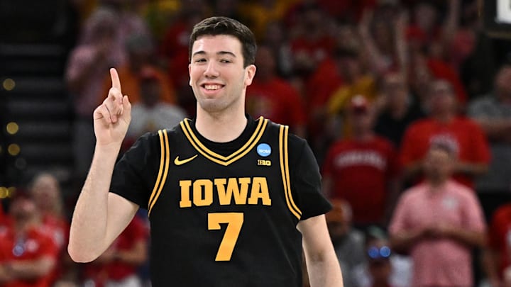 Mar 26, 2026; Houston, TX, USA; Iowa Hawkeyes forward Alvaro Folgueiras (7) reacts against the Nebraska Cornhuskers in the second half during a Sweet Sixteen game of the South Regional of the men's 2026 NCAA Tournament at Toyota Center. Mandatory Credit: Maria Lysaker-Imagn Images